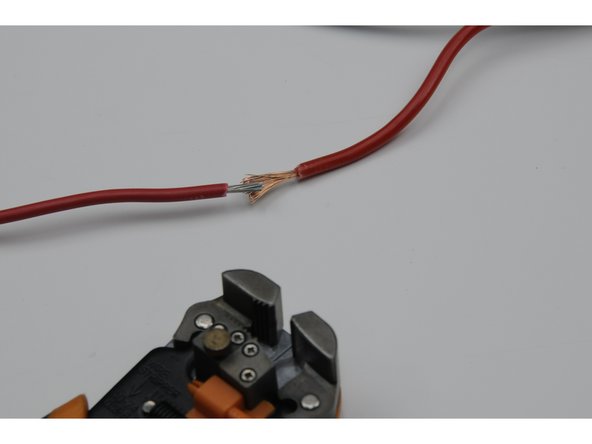 Twist the exposed wires together, forming a temporary joint that is as straight and smooth as practical. (No wires sticking off at an angle)