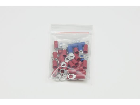 The Development Class control box refresh kit includes new 100 cm (40 inches) of 18-gauge wire to construct the X’s and power jumpers on the back of each switch, and 34 new terminal ring connectors (28 red, 6 blue) to crimp on the end of the wires.