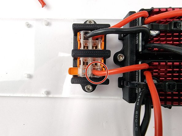 Open the 2 levers on the Wago 221 connectors as shown