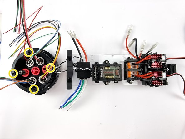 In the next steps we will be trimming the wires to length from the bulkhead connectors. To be able to accurately determine the length we need to cut them to its best to secure the support plate mount onto the end cap.