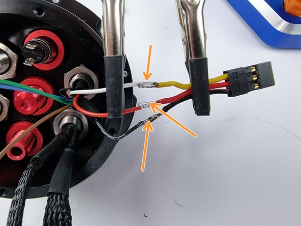 Now solder the wires together making sure the white wire is soldered to the yellow wire, the two red wires soldered together and the two black wires soldered together.