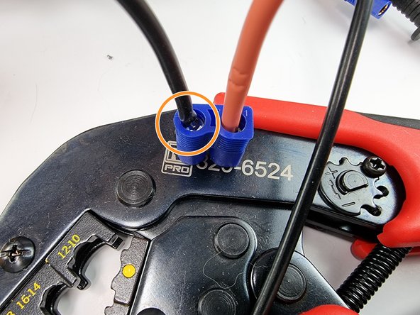 Now insert the pin on the black wire into the other hole of the connector.