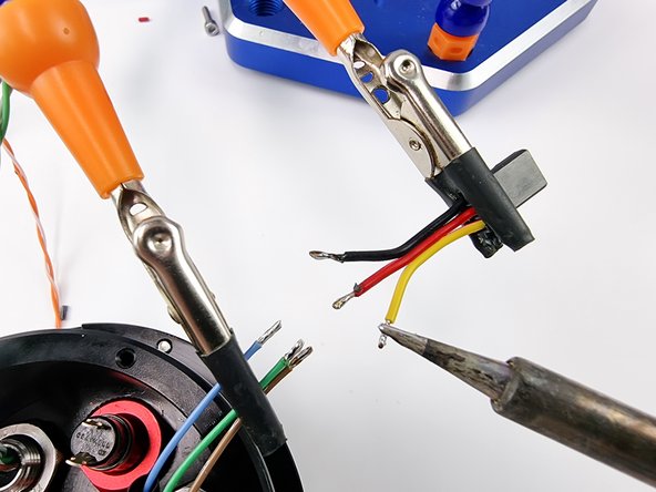 First tin the ends of each wire with solder