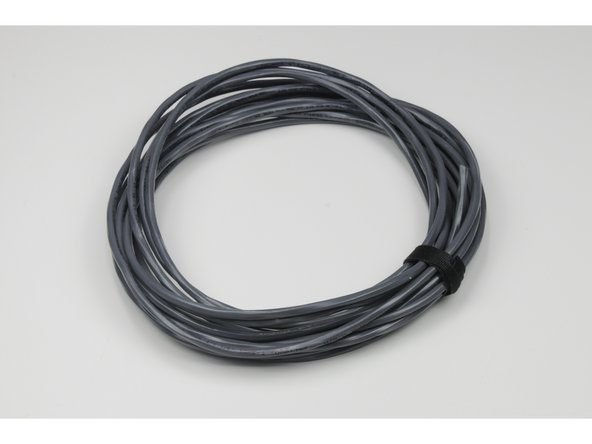 If de-soldering is not an option, the cut should be made on the grey cable side of the soldered connections, as to not reduce the already shortened length of the motor wires.