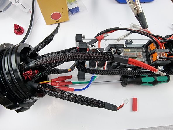 Optional: if you want to sleeve the wire now is the time to do it before we solder the wire to the fuse holder.