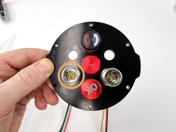 Install the 4 pin bulkhead connector in the bottom left hole of the end cap