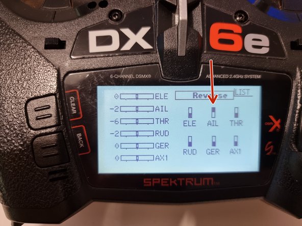 Scroll to travel at the top and click and scroll until you get to reverse.