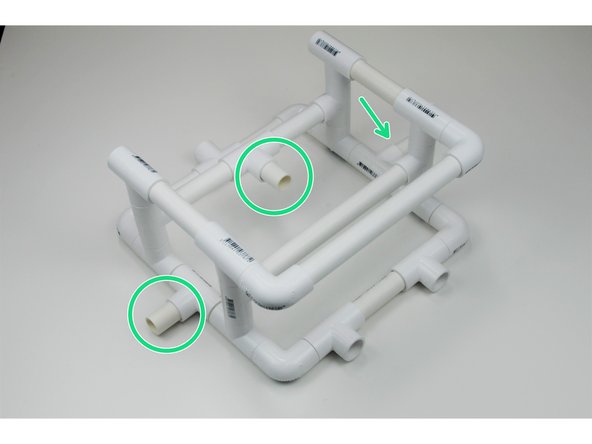 Take the three 40mm Pipe Section and insert them into the three open Tee Joints on in the base of the ROV frame.