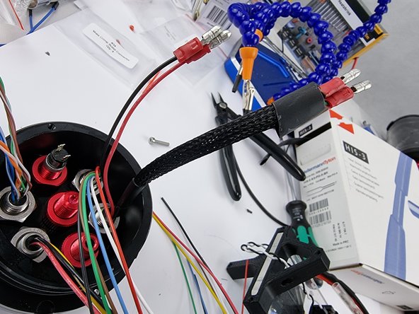 Optional: You can use cable sleeving to protect the wires and neaten them.