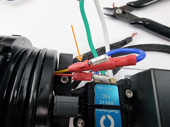 Slide on a male bullet connector and crimp it into place. Ensure that you give it a tug to check it has crimped onto the wire correctly.