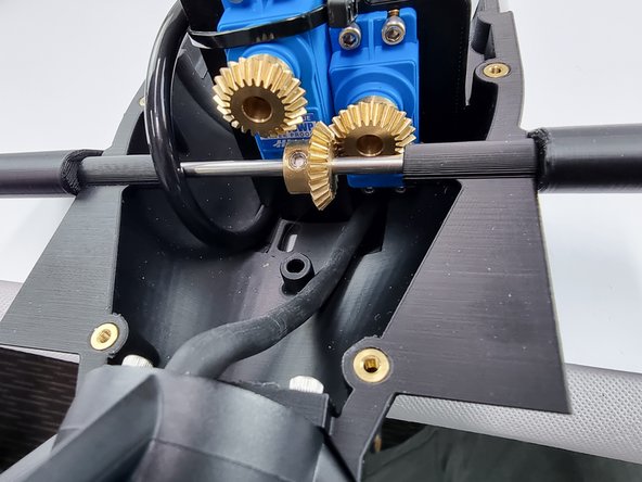 Remove the slack from the thruster cable by feeding it through to the front of the Sub.