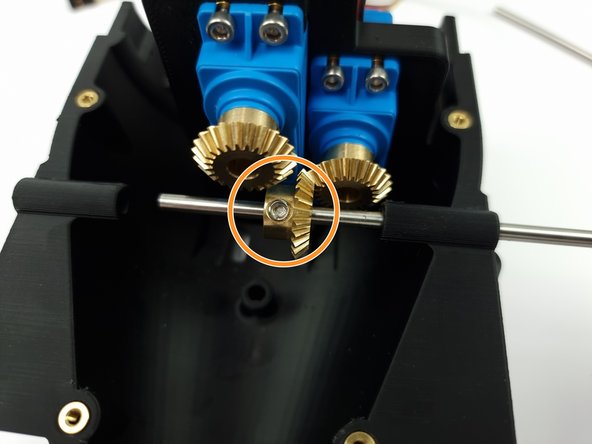 Slide the 4mm Bevel gear onto the control rod.