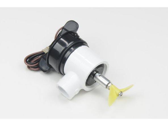 Apply one drop of Purple Loctite to the set screw and screw it all the way in, tighten the set screw securely against the flat part of the propeller shaft.