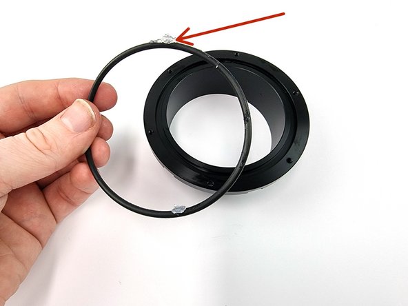Apply a thin coating of silicone grease to the thin o-ring.