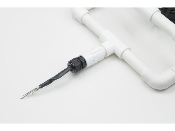 To do so, start by identifying where the motor wires have been soldered to the tether wires.