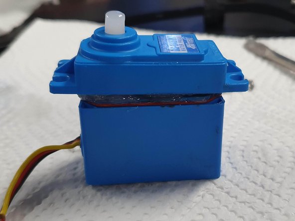 Now that the Lid and gears have been filled/covered with silicone grease we can reinstall the lid