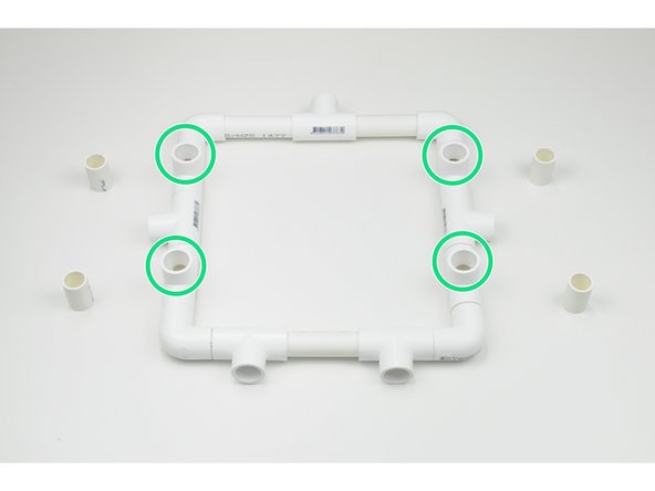 Place the 32mm Pipe Sections into the  upright Tee Connectors of the base.