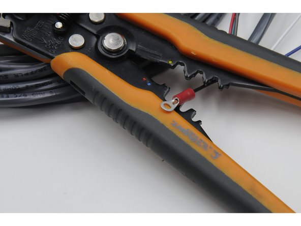 Use crimps to attach a red terminal crimp to the end of each of the six colored wires in the tether