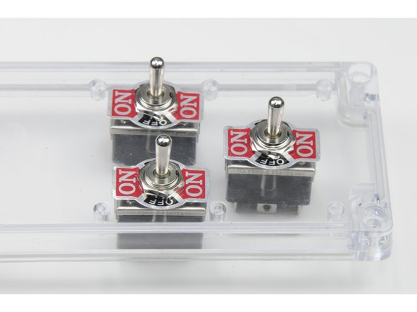 Install the second nut for all three switches.