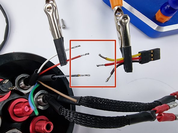 First we need to tin the wires with solder to prepare them for soldering together
