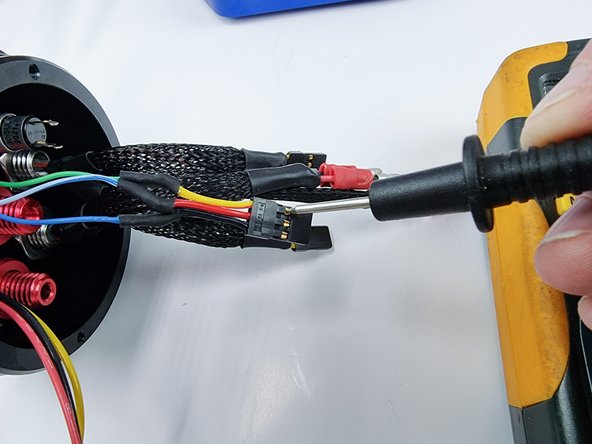 Using a multimeter check the continuity across the pins on the black connector to the pins on the bulkhead connector to ensure a good solder joint has been made.