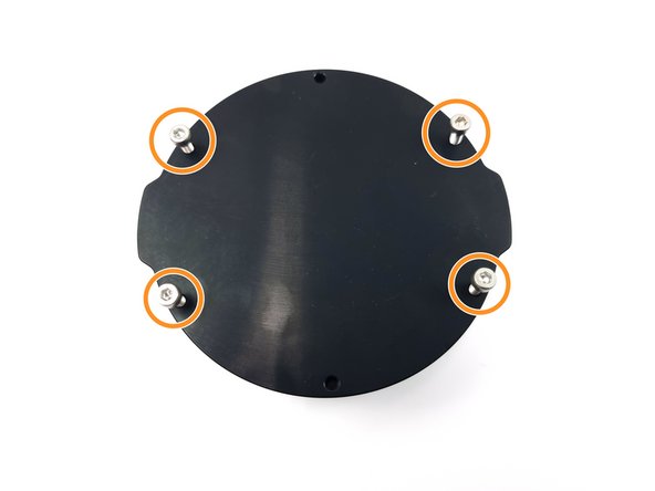 Place the end cap onto the flange and install 4 of the M3 x 12mm screws as shown in the photo