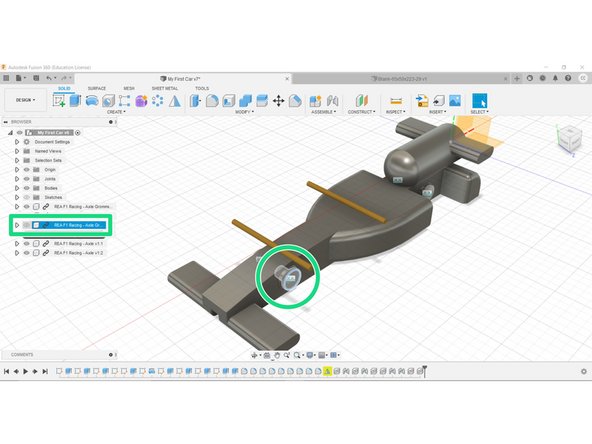 First, Click the Axle Grommet that is obstructing the axle hole. This will highlight the component in the Part Tree.