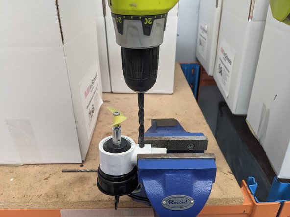 Use the 8mm drill bit to enlarge the hole.