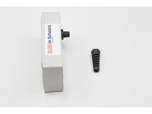 Loosely screw the stress relief (long) onto the larger threads.