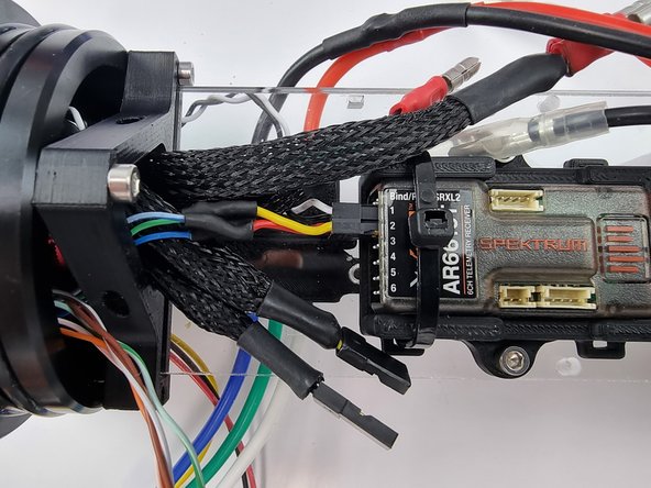 Plug the connector into channel 2 of the receiver.