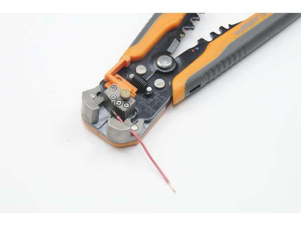 Strip .75 cm of wire of each end of the six wires.