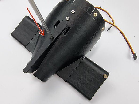 Slide the 212m Control rod through the vertical hole of the Bottom Aft Cap.