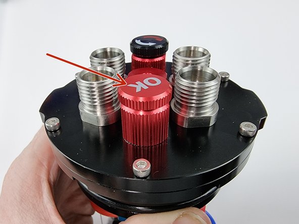 Before we insert the assembled end cap with support plate into the acrylic tube we need to remove the vent plug