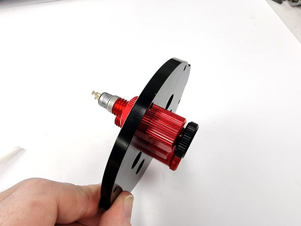 Push it in past the 2 o-rings and screw it in. don't screw it all the way in as that will activate the power button.