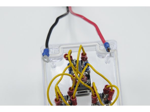 Set your clear plastic faceplate upside down to access the bottom of the switches.