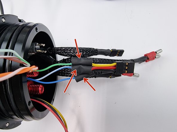 Once the wires have been soldered together and have been allowed to cool down slide the heat shrink over the soldered joint