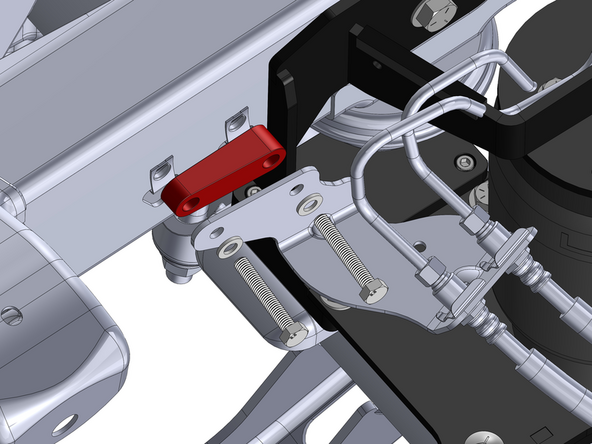 Install the brake line relocation bracket in orientation shown with supplied M8 bolts and washers.