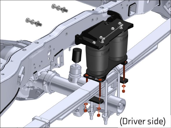 Use the supplied 3/8" hardware and leaf spring straps to attach the lower air spring bracket to the leaf spring.