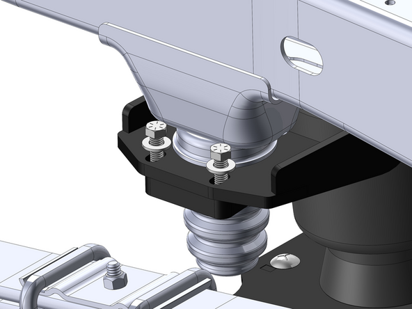 Go back to the upper bracket and install the provided 3/8" Grade 8 hardware into the bump stop spacer as shown.