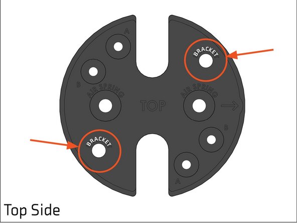 For the final spacer in your stack, place a 3/8&quot;-16 nut in the two hex holes on the underside of the lift spacer that correspond to the holes marked &quot;BRACKET&quot; on top of the lift spacer.