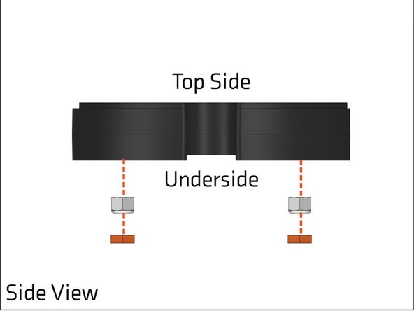 Press a 1/4&quot; hex spacer in the two hex holes, on top of the nuts, as shown. This will secure the nuts in the hex holes.