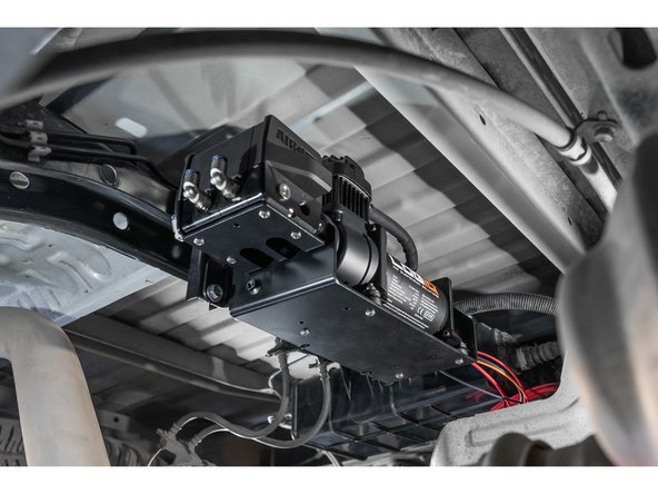 Use the supplied 1/2&quot; bolts with washers to mount the AirIQ assembly to the frame in the orientation shown (AirIQ facing the front of the truck). Snug hardware.