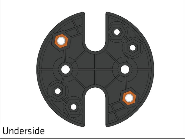 Press a 3/8&quot; hex spacer in the two hex holes, on top of the nuts, as shown. This will secure the nuts in the hex holes.