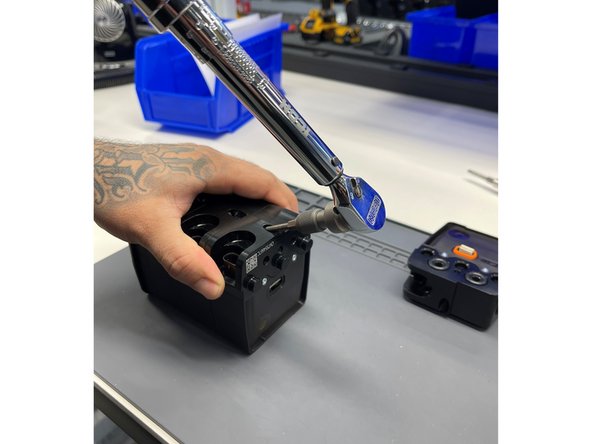 Torque the screw to 50 in-lb.