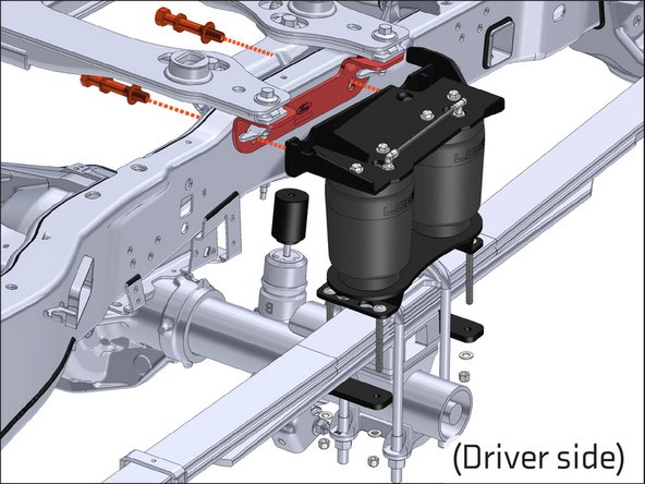 Use the supplied 4" long Grade 8 5/8" bolts, with split washers and flat washers, to attach the upper air spring bracket to the outside of the hitch, through the factory hitch mounting holes. Snug hardware.