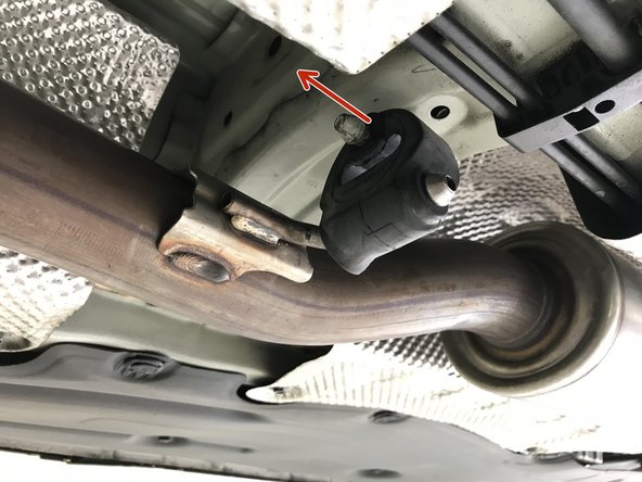 Use the tongue &amp; groove pliers to pull the rubber hanger off the chassis rod in the direction of the red arrows