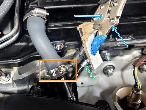 Reinstall crank breather hose using provided worm drive clamp as shown