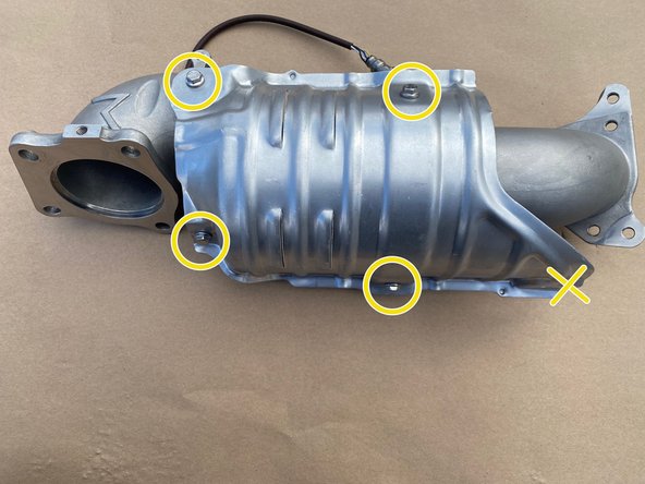 You will not be using the lower bolt hole on the OEM heat shield.