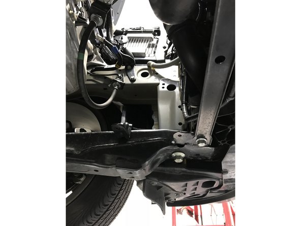 Remove the lower airbox assembly from the vehicle