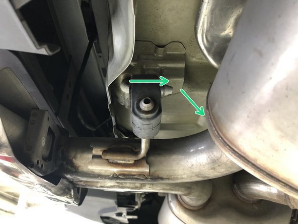 Pull the rubber hangers off the chassis hanger rods and rotate downward; the rubber hangers will stay on the exhaust